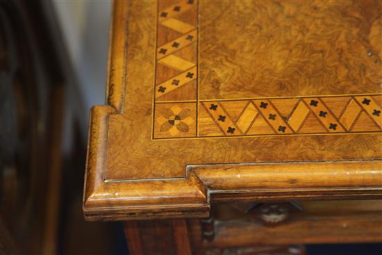 A Victorian Gothic revival walnut and marquetry rectangular card table, in the manner of Lamb of Manchester, W.3ft 2in.